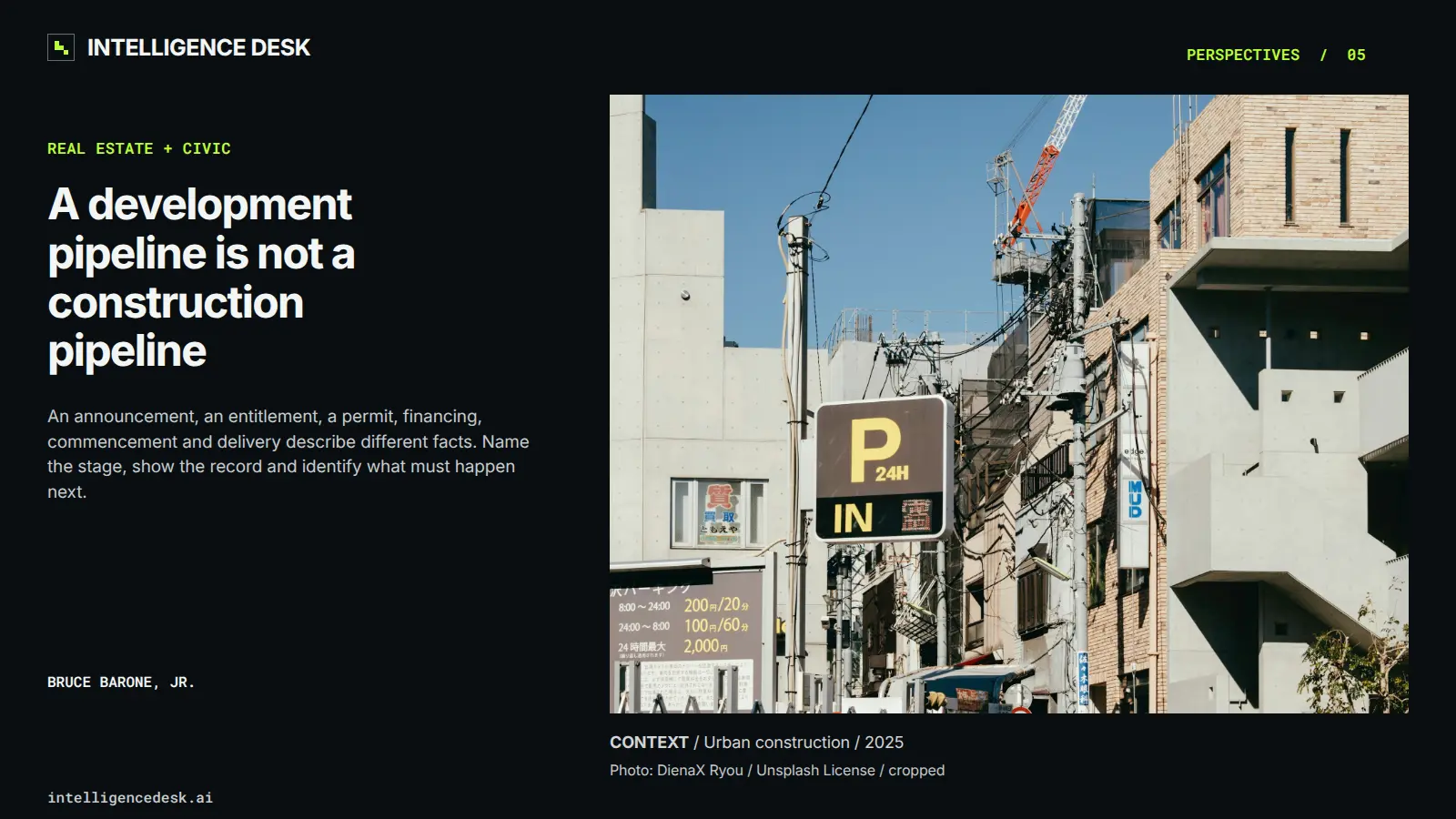 Contemporary photograph of an urban street and construction crane; context illustration, not evidence of any specific project or development stage.